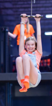 Indoor view of people jumping and playing at Sky Zone Trampoline Park